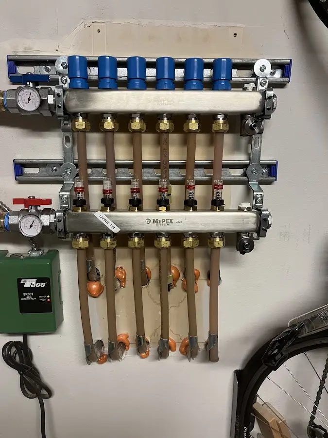 Plumber performing Gas Line Installation at a residential property in Holland